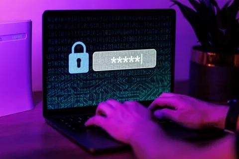 Man typing password on personal computer. Close up shot of cyber security Stock Photos