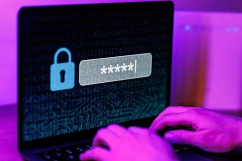 Man typing password on personal computer. Close up shot of cyber security Stock Photos