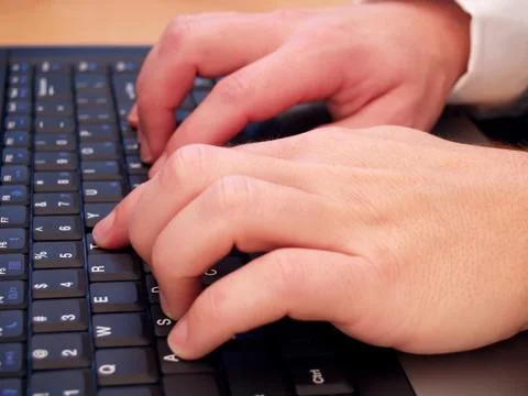 Man typing Foto stock