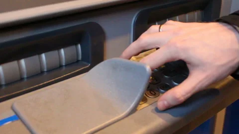Man is typing pin code. Taking money from ATM Stock Footage 88742227