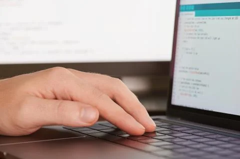 Man typing programming code 写真素材