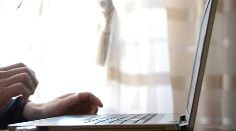 Man typing quickly on laptop with only hands visible Stock Footage 47037097