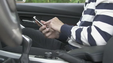 Man typing on a smart phone Stock Footage 64232142