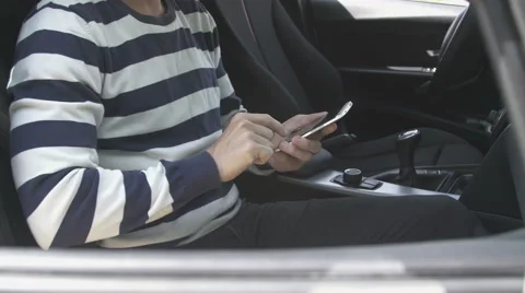 Man typing on a smart phone Stock Footage 64232208