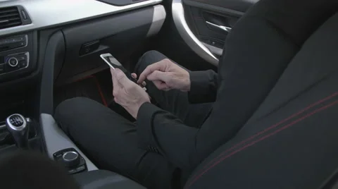 Man typing on a smart phone Stock Footage 64232320