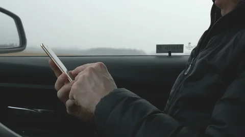 Man typing on a smart phone Stock Footage 85673215