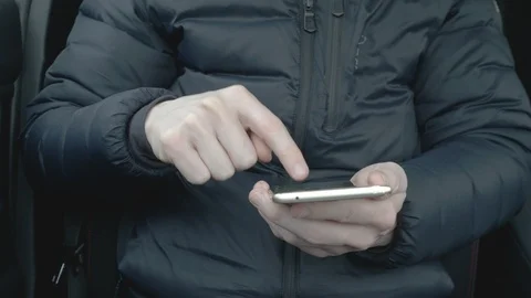 Man typing on a smart phone Stock Footage 85694029