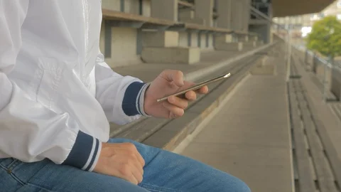 Man typing on a smart phone Stock Footage 92438000
