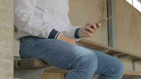 Man typing on a smart phone Stock Footage 92438488
