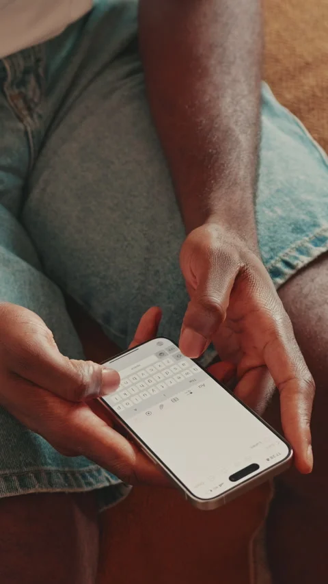 Man Typing on Smartphone, Engaging in Digital Communication Stock Footage 330938875