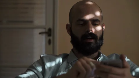 Man Typing on Smartphone Video stock 85604523