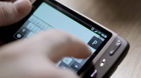 Man typing on smartphone virtual keyboard Stock Footage 10755816