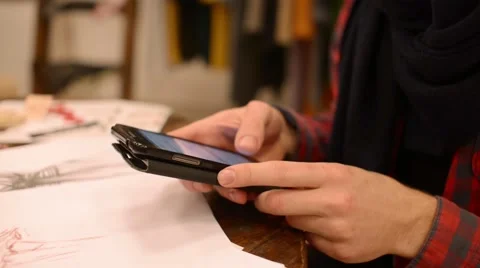 Man typing sms and get chating on the smartphone - close up Stock Footage 58631490