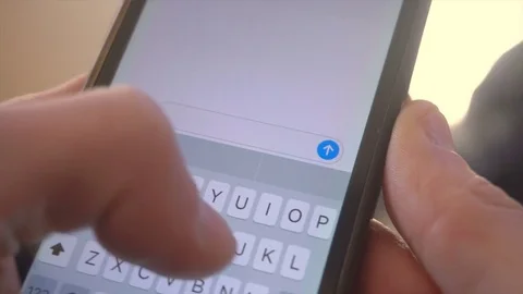 Man typing sms on smartphone close-up Stock Footage 71711333