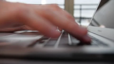 A man is typing something on a laptop Video stock 152515002