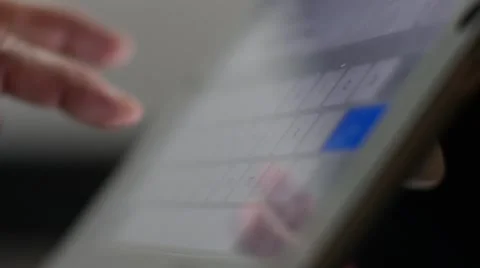 Man typing on a tablet computer Stock Footage 59145712