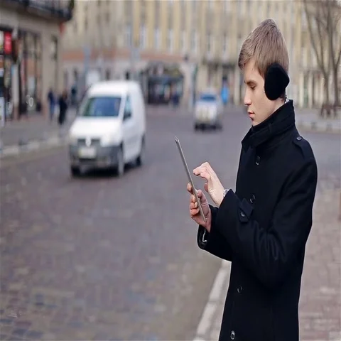 Man typing on tablet Stock Footage 69550597