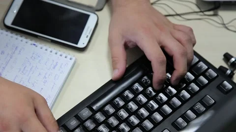Man typing text on the keyboard Stock Footage 68647750