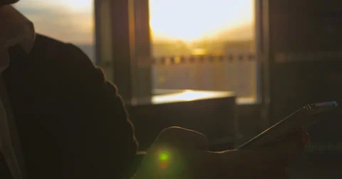 Man typing text message at the airport terminal Stock Footage 51848828