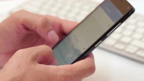 Man typing text message 動画素材 181064303