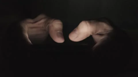 Man typing text on smartphone in dark 스톡 동영상 265878516