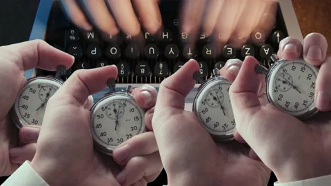 A man typing on a typewriter and stopwatches in hands Stockbeeldmateriaal 235156584