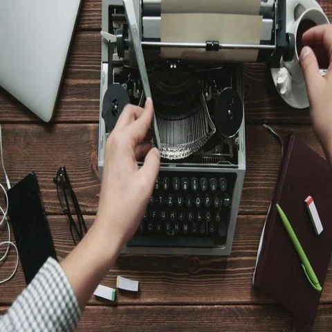 Man typing on typewriter Stock Footage 69544485