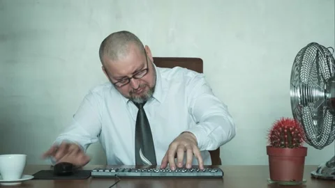 A man is typing very fast on the keyboard. Stock Footage 170997771