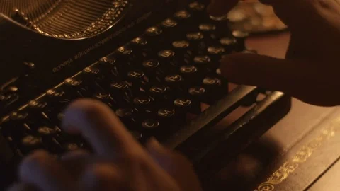 Man is typing on the vintage typewriter Stock Footage 73348652