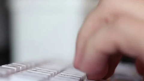 Man typing on a white keyboard. hands closeup Stock Footage 72560550