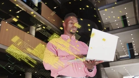 Man typing on white laptop in atrium, generating green code streams layering Video stock 334768418