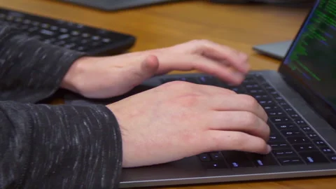 Man Typing on Work Laptop Computer Video stock 140409609