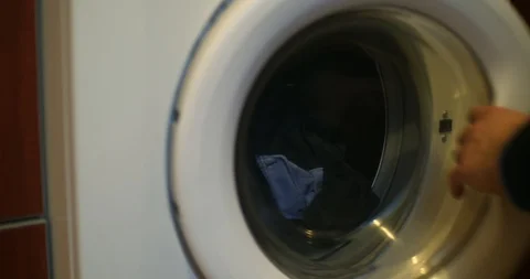 Man uload washing machine close up Stock Footage 86979014