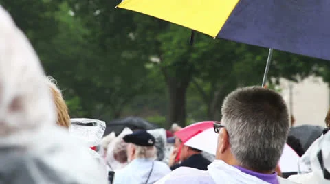 Man with Umbrella at Event Stock Footage 23720682