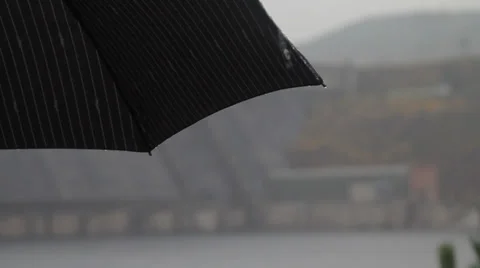  The man with the umbrella.   Stock Footage 32221821