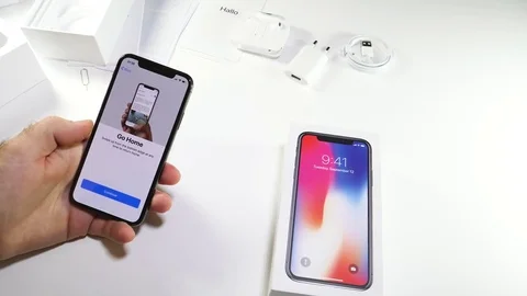 Man unbox the latest iPhone x activation true tone display Stock-Footage 82142529