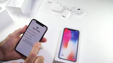 Man unbox the latest iPhone x activation tim-lapse fast motion Stock Footage 82148378
