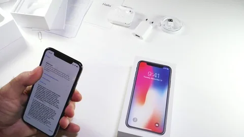 Man unbox the latest iPhone x activation terms and conditions time-lapse, fast Stock-Footage 82148772