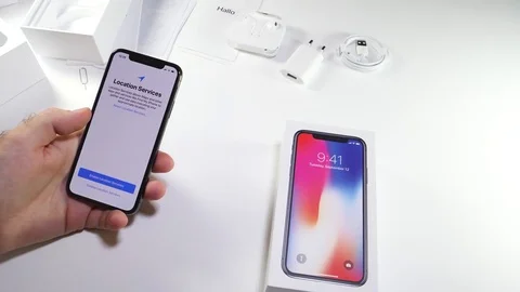 Man unbox the latest iPhone x activation terms and conditions 動画素材 82148852
