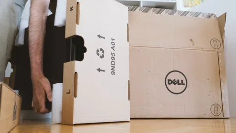 Man unboxing new Dell Computer Precision Workstation Stock Footage 90692958