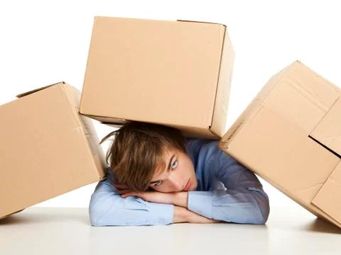 Man under boxes Stock Photos