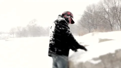 Man Under a Snow Storm Stock Footage 162257104