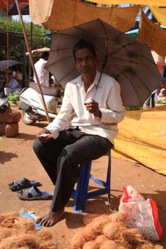Man under an umbrella Stock Photos