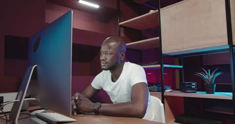 The man understands what is happening on the computer screen Video stock 155056030
