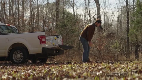 Man unloading bricks from a pickup truck... | Stock Video | Pond5
