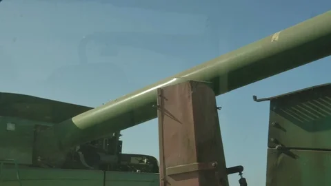 Man unloading wheat from truck 스톡 동영상 125068483