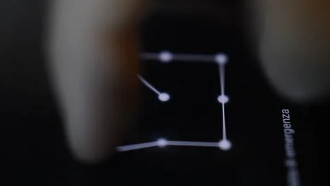 Man unlock phone screen with the sequence password. Stock Footage 231689007