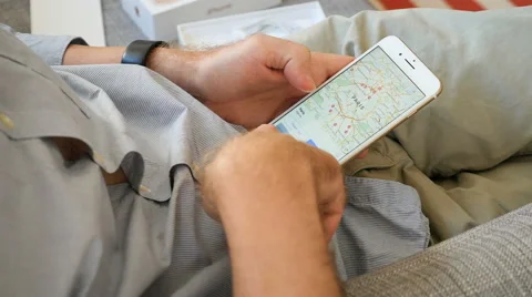 Man unlocking iPhone 7 apple maps flyover Paris France Stock Footage 68449620