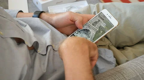 Man unlocking iPhone 7 apple maps flyover Paris France Stock Footage 68450316