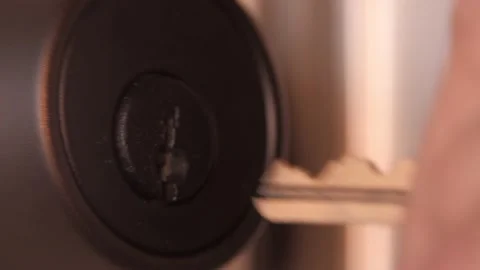 Man Unlocks And Opens Door - Macro Stock Footage 148397684